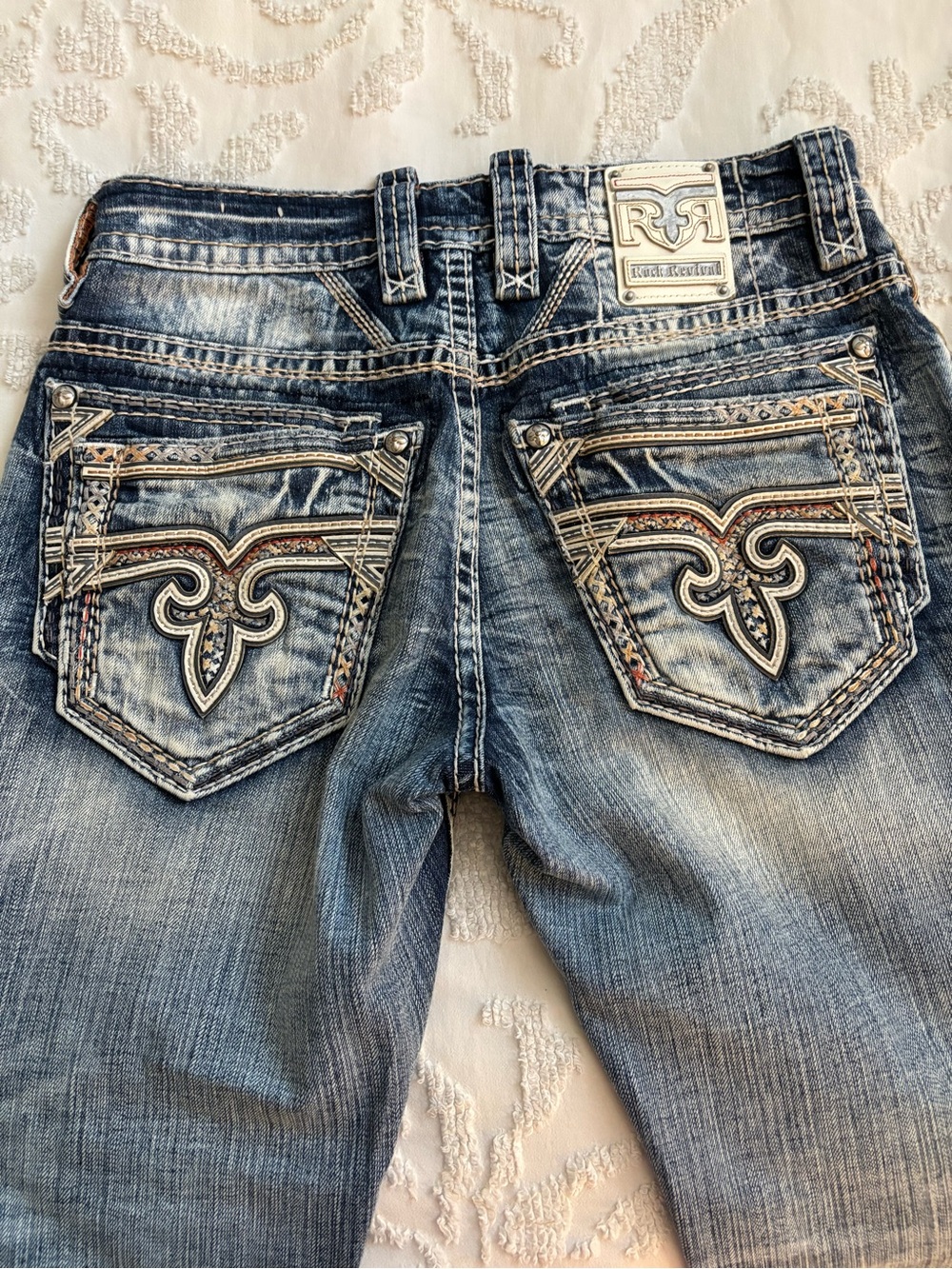 Rock Revival Slim Distressed Light Blue Jeans